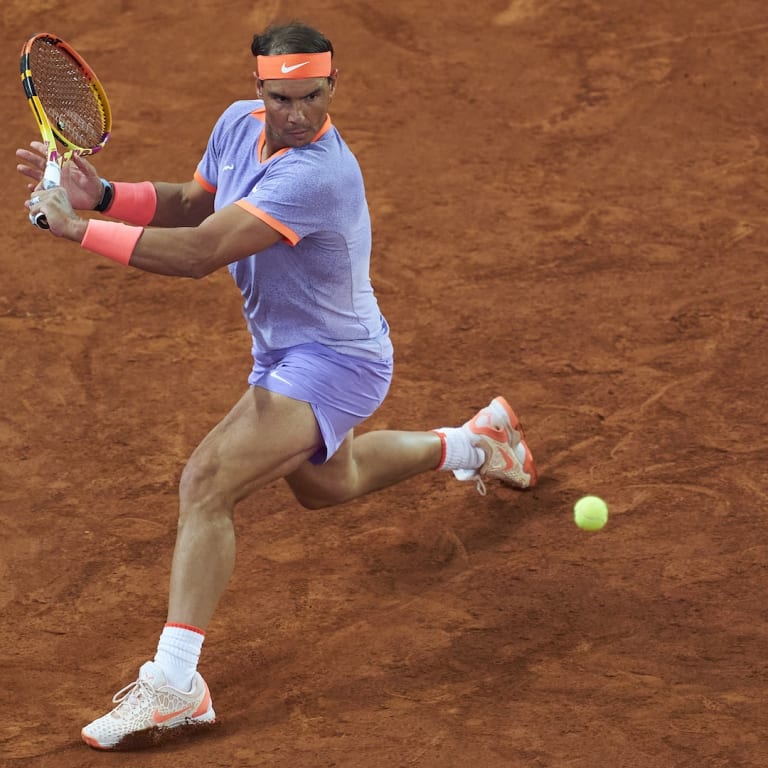 Nadal survives Cachin in three