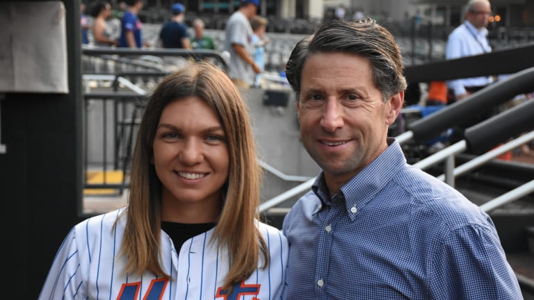 WATCH: Halep throws
out first pitch at
NY Mets game