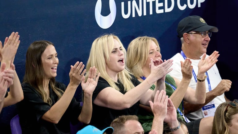 Actress Rebel Wilson (center) cheers on Team Australia alongside Lleyton Hewitt's wife Bec in Sydney.