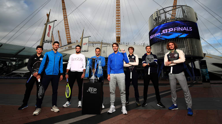 The 2019 edition kept things casual, players posing in front of The O2 in training gear and sneakers with a racquet in hand.