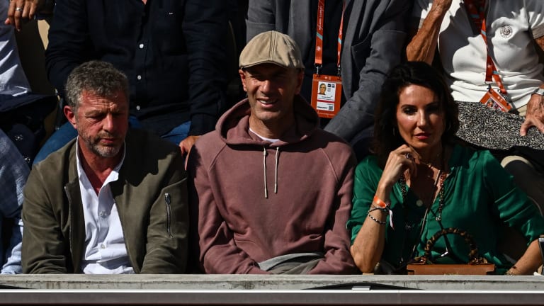 Zinedine Zidane (center) in the stands for Nadal's match.