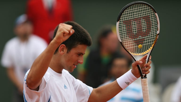 Of his early career wins, Novak Djokovic celebrates victory against Tommy Haas during the 2006 French Open.