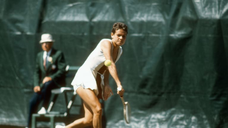 Goolagong at the 1976 US Open. Notice her off hand, perpendicular to the court for the necessary balance.