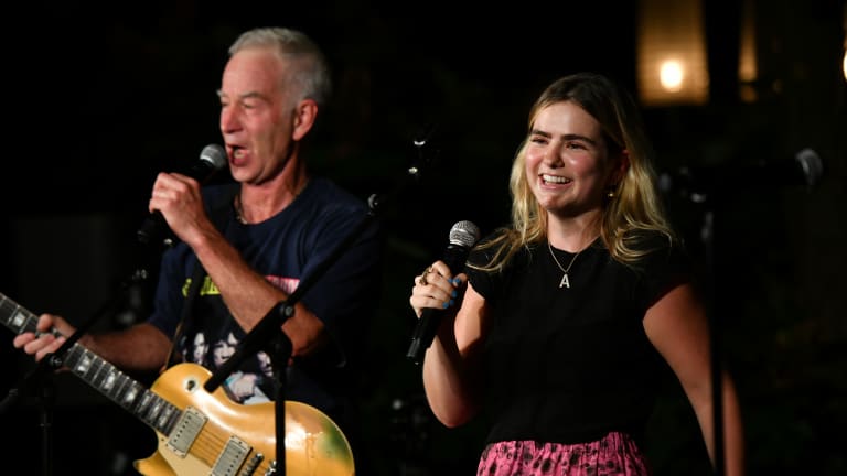 New York icon John McEnroe played with alongside daughter Ava to a crowd of foodies and players.