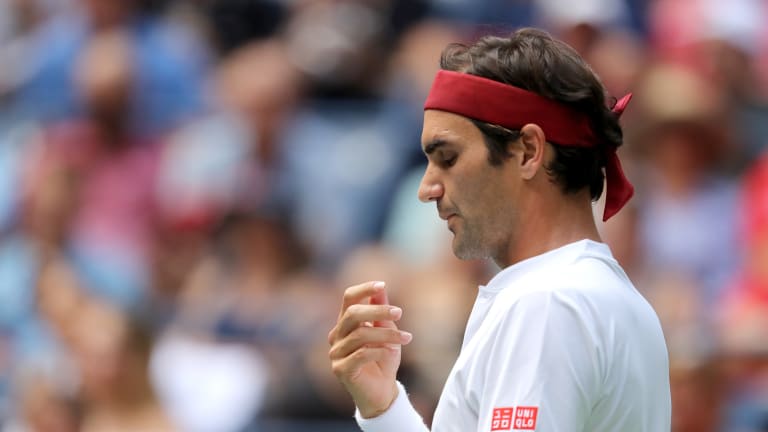 Federer easily handles unusual party guest in second round of US Open