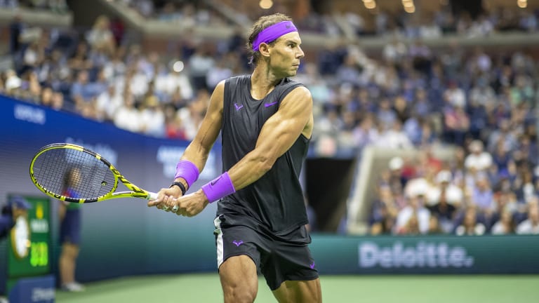 Nadal brought back the all-black Nike kit—this time with a pop of purple—and made a return to sleeveless shirt during his vintage 2019 US Open title run.