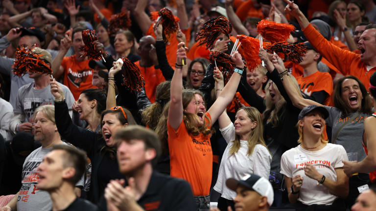 March Madness: The 15th-seed Tigers and their fans celebrate a shocking win over second-seeded Arizona.