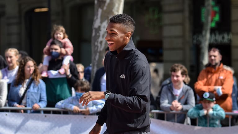 Auger-Aliassime was all smiles Monday when he and Alcaraz delighted onlookers in front of Gaudi's Casa Mila.