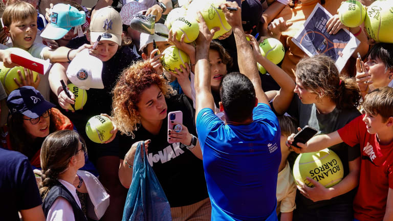 After wrapping with his team, Djokovic served up signatures left and right—ensuring more than the front row had an opportunity to leave with a special memento.