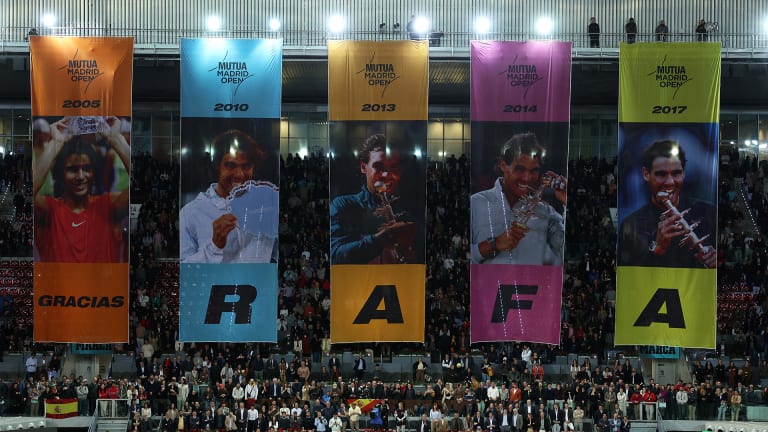 Five banners for Rafael Nadal's five titles in Madrid.