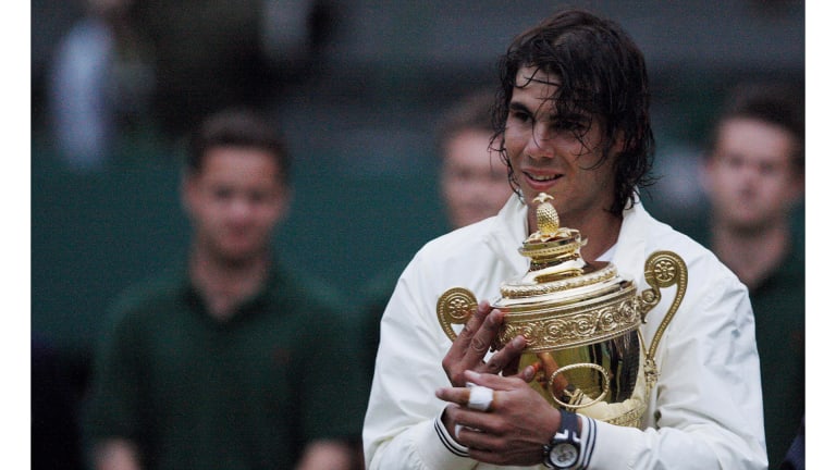 Nadal lifted the Wimbledon trophy for the first time in 2008, and took in a moment for the ages in an instantly recognizable Nike warmup jacket and luxury watch.