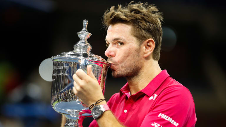 Photo of the Day: 
Wawrinka takes home
the US Open trophy