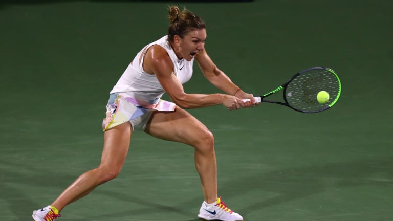 Her Dubai lead gone and later facing match point, Halep topples Jabeur