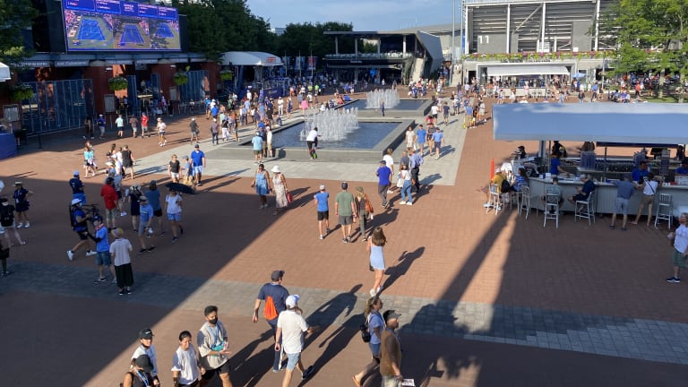 The people milled around the National Tennis Center with a feeling of normalcy.