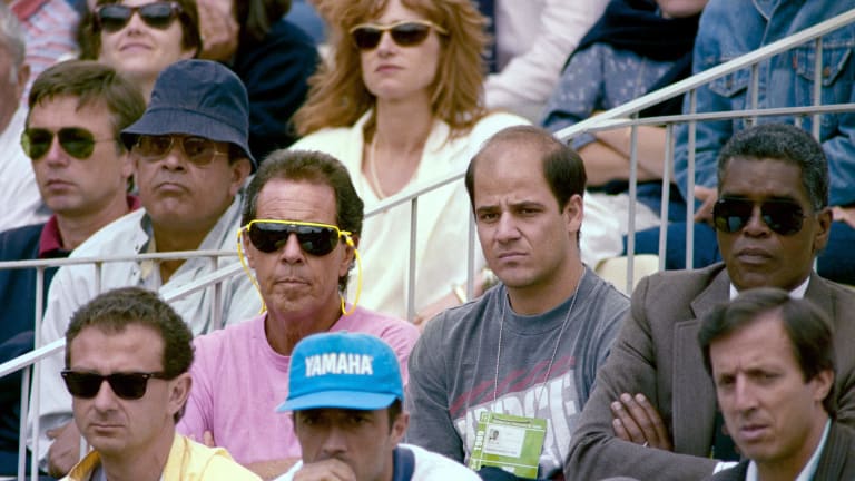 Nick Bollettieri and Andre Agassi's brother, Phillip Agassi, were pictured sitting together as they watched the 1989 French Open.