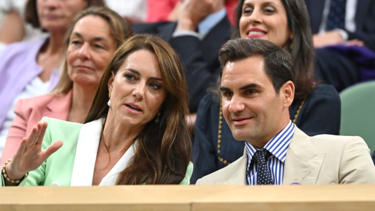 Trading tactics? HRH The Princess of Wales and Federer look on during Murray's straight-set win.