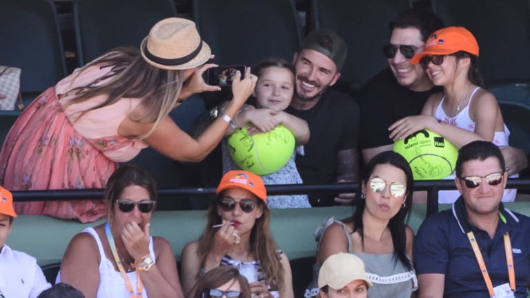 David Beckham snapped photos with his family during the 2018 tournament, the last edition held in Key Biscayne.