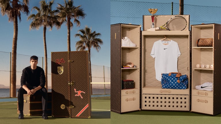 Alcaraz's custom Malle Vestiaire includes hand-painted logos including a silhouette of a man playing tennis and a tennis ball that reads "Since 2003".