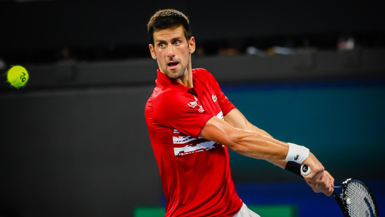 Spain dominates Uruguay; Djokovic's double duty helps Serbia advance