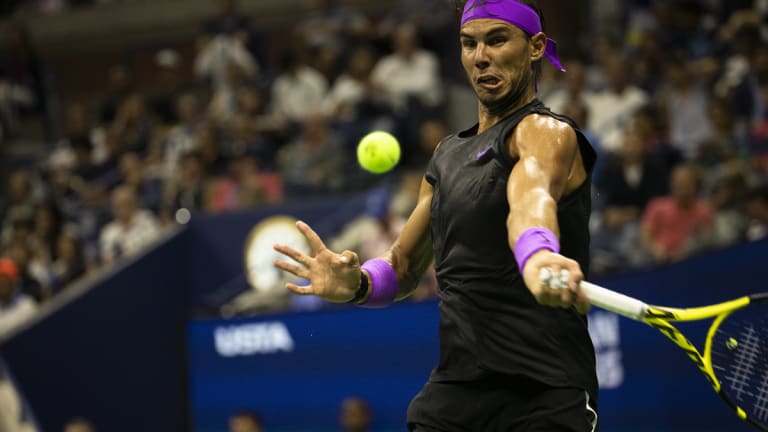 Nadal went around the net, and threw down the gauntlet, against Cilic