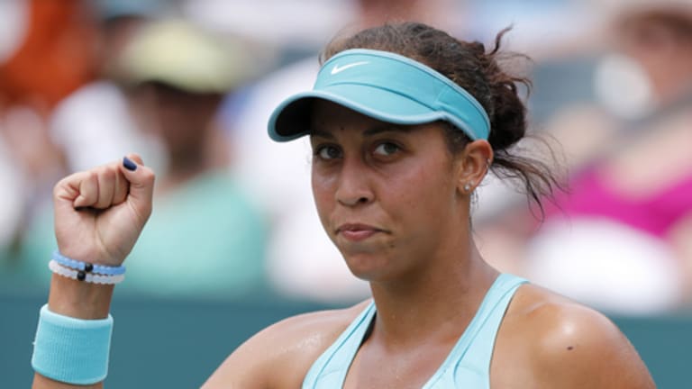 Madison Keys celebrates a point against Lauren Davis during a quarterfinal match at the Family Circle Cup tennis tournament in Charleston, S.C., Friday, April 10, 2015. Keys won 6-2, 6-2. (AP Photo/Mic Smith)