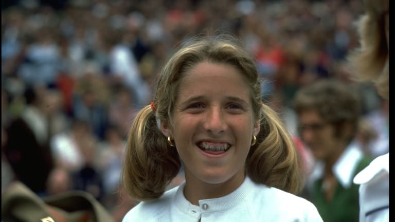 A young Tracy Austin exudes excitement during the 1977 Wimbledon Championships.