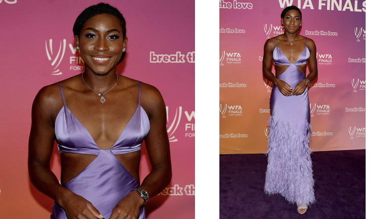 Coco Gauff paired her purple cutout dress with a tennis racquet necklace.