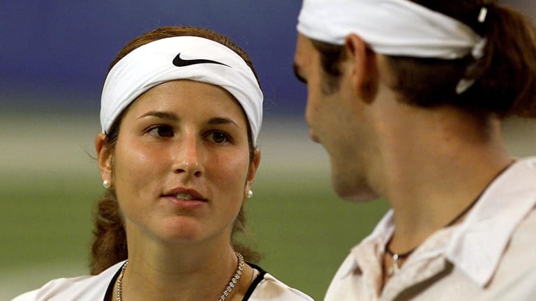 2001: Just before the calendar page turned to a New Year, sharing the court at the 2002 Hopman Cup.