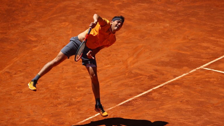 In his eighth consecutive week on clay, Taylor Fritz slides on