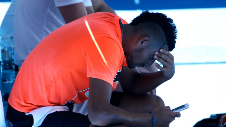 Nick Kyrgios loses a tough match, but gains much-needed perspective
