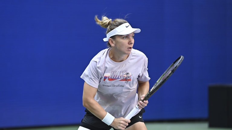 After pulling out of Cincinnati with a "small tear" to her right adductor, Simona Halep hit the courts for a trial run.