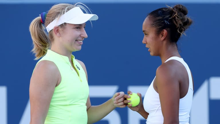 Fernandez partnered with Saville (left) in women's doubles and caused a major upset of the No. 2 seeds.