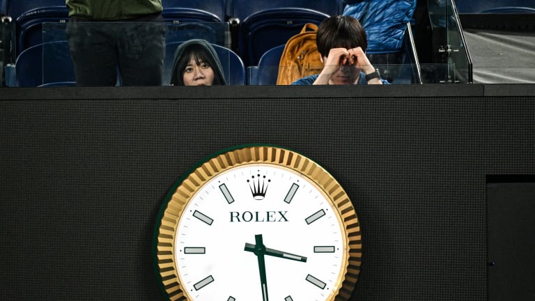 Fans trying to keep their eyes open at 3:29 a.m. local time, during the fifth set of Medvedev vs. Ruusuvuori.