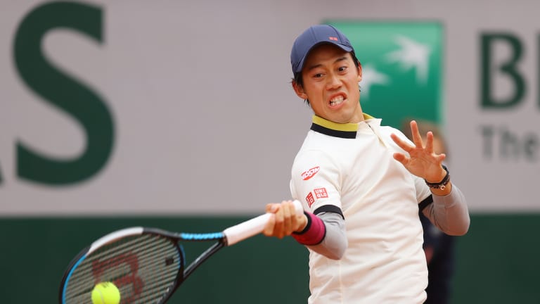 Healthy Nishikori quietly outlasts Evans in five-set rollercoaster