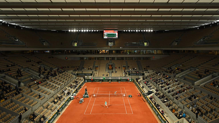 Who was Philippe Chatrier, namesake of Roland Garros' roofed court?