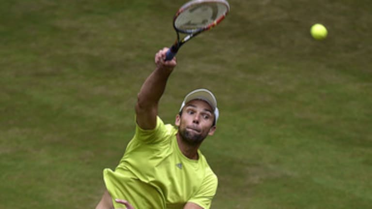 Karlovic passes 10,000 aces in win over Raonic, but seeks another milestone