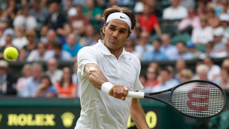 Federer into 35th Grand Slam semifinal with win over Wawrinka