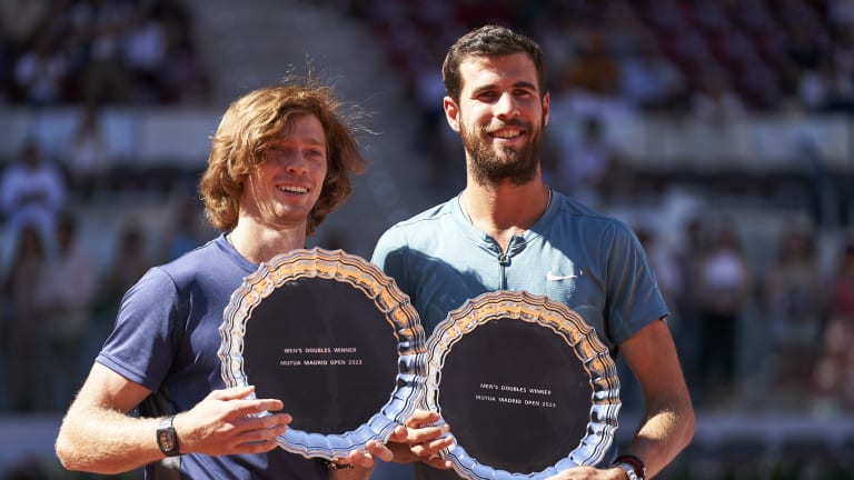 In singles, Khachanov (right) ended Rublev’s Madrid campaign with a 7-6 (8), 6-4 victory in the fourth round.