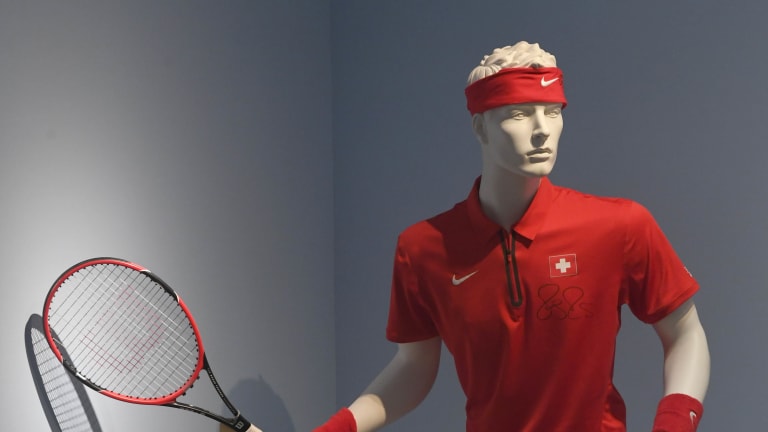 Some of the Swiss' title-winning apparel was auctioned at Christie's London, to benefit the Roger Federer's Foundation. (Photos from June 21, via Getty Images.)