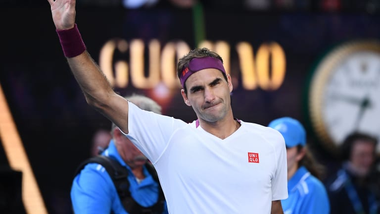 Federer saves seven match points in quarterfinal escape of Sandgren