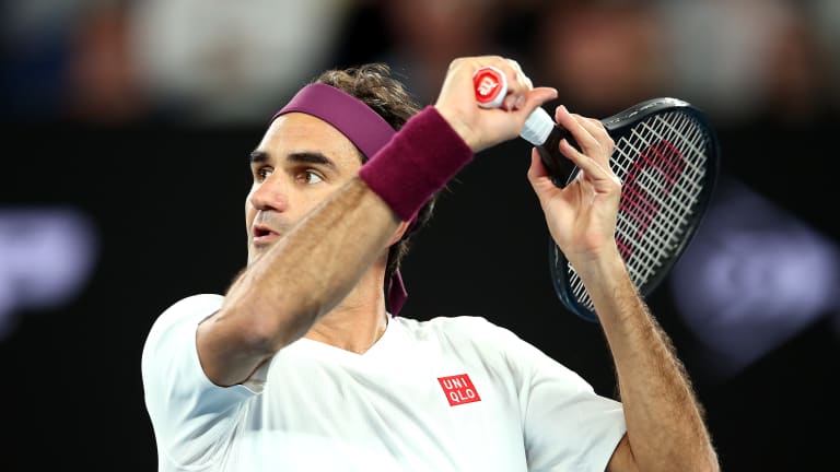 Federer dials up heat to contain Fucsovics; into Melbourne final eight