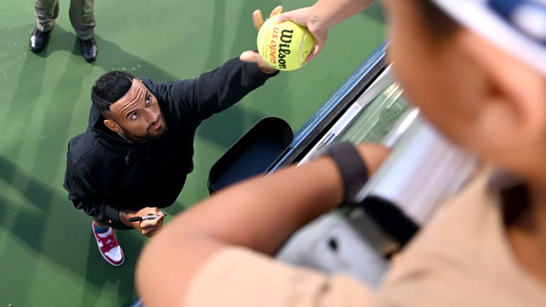 After announcing his withdrawal from the tournament in person, Kyrgios stayed on court to sign some autographs for fans.