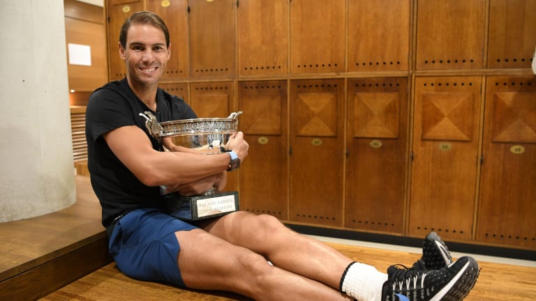 Top 5 Photos, 10/12:
Nadal embraces 13th 
Roland Garros trophy