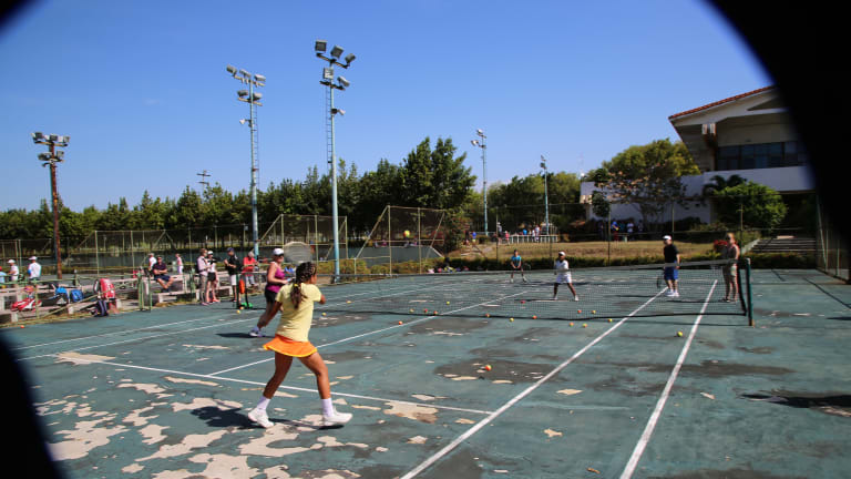 Courting Friendship:
A U.S. firm helps
revive Cuban tennis