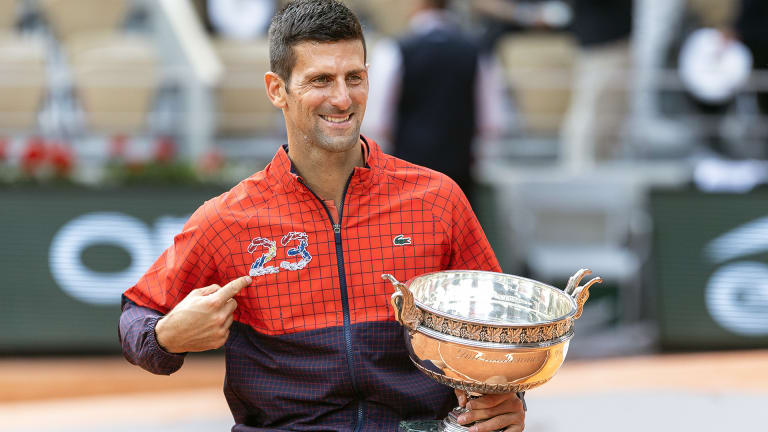 Djokovic's "23" jacket was themed Roland Garros red as he broke the men's Open Era Grand Slam record in Paris.