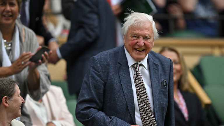 Famed British broadcaster and naturalist Sir David Attenborough got a standing ovation from the Centre Court crowd as he took his seat.