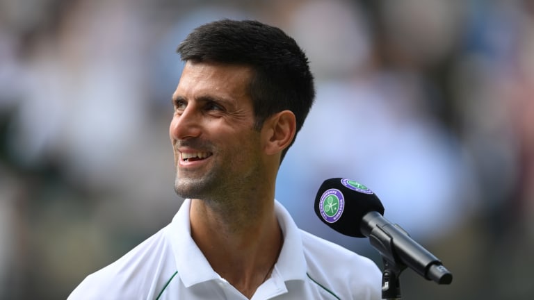 Novak Djokovic enjoys his time in front of the mic.