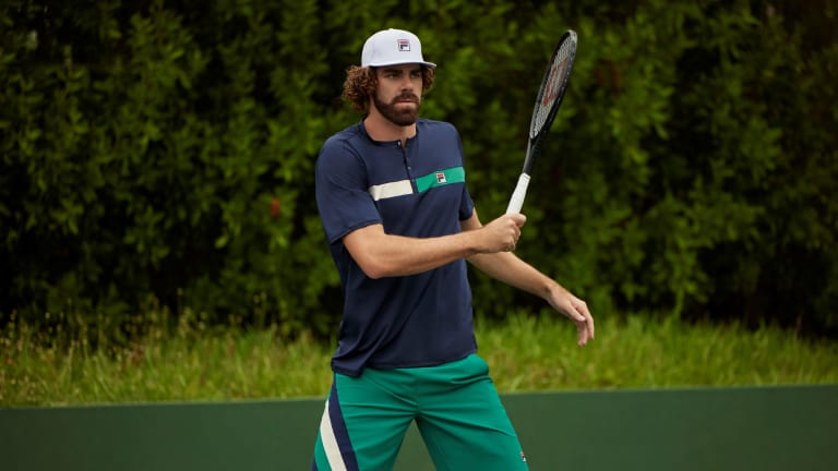 Though he won't play the tournament, Reilly Opelka is pictured here modeling some of Fila's men's US Open collection.