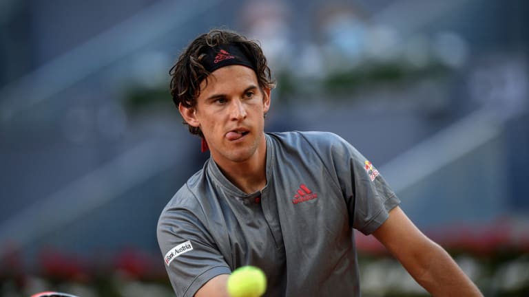 Dominic Thiem, the 2020 champion, lead the men's singles wild cards list, which also features Sam Querrey and Ben Shelton.