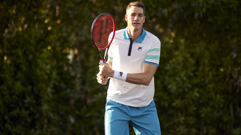 John Isner sports the collection’s Short Sleeve Classic Polo made with recycled mesh interlock in the Blue Ibiza/Hawaiian Ocean/White colorway paired with Hawaiian Ocean Stretch Woven Shorts.